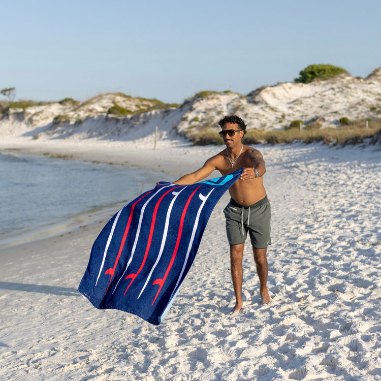 Qwave Beach Gear - Flying Discs, Surf Wax, and More for the